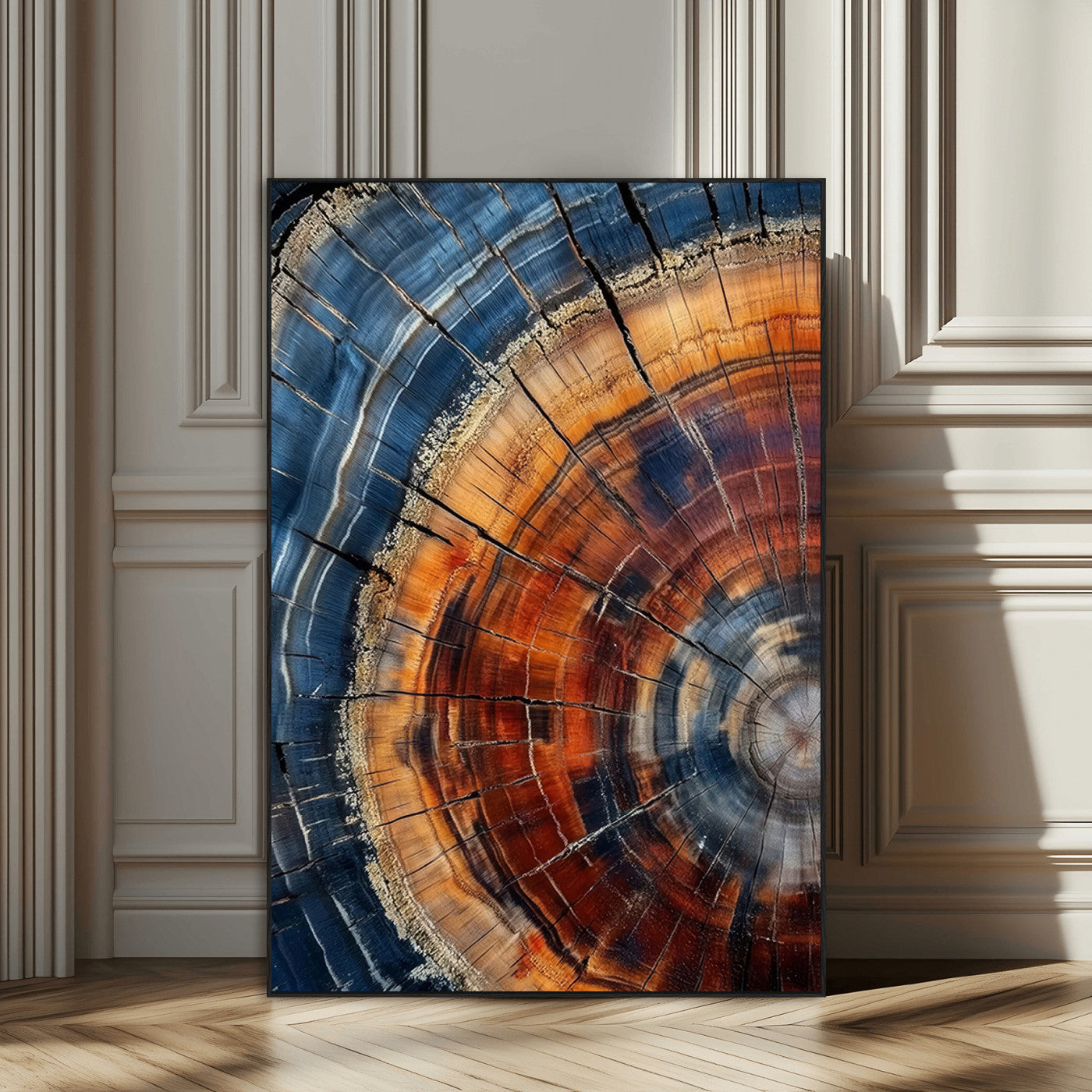 Canvas of colorful tree rings in rich blue and warm orange hues with cracked natural texture, ideal for rustic or earthy decor styles.