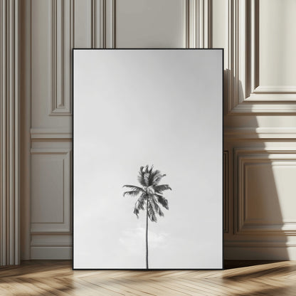 Canvas of a single palm tree in black and white with minimalist sky, ideal for modern coastal minimalist or tropical-inspired home decor.