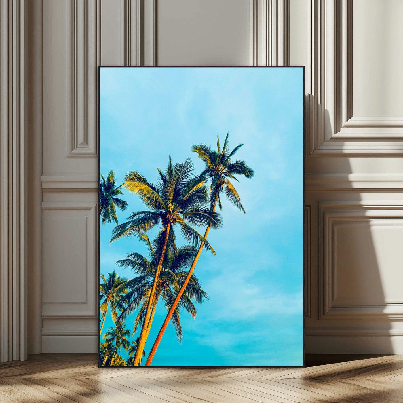 "Tall palm trees with golden sunlight against a vibrant blue sky, creating a tropical, relaxing atmosphere for coastal and beach-themed decor.