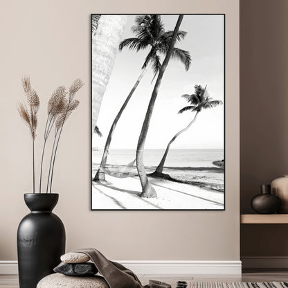 Black and white wall art of palm trees and a hammock on a beach, ideal for coastal minimalist or tropical-themed decor.