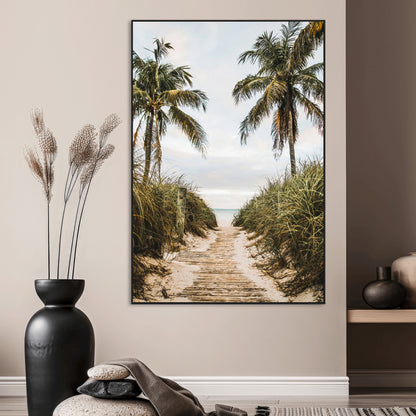 Canvas wall art of a tropical beach path with palm trees and dune grass, ideal for coastal entryways or tropical-inspired home decor.
