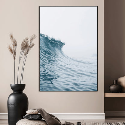 A single ocean wave curling in soft blue tones under a misty sky, ideal for coastal or minimalist home wall decor.