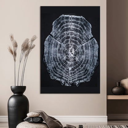 Monochrome tree ring cross-section on black background, showing detailed growth lines, perfect for modern rustic or minimalist interiors. (