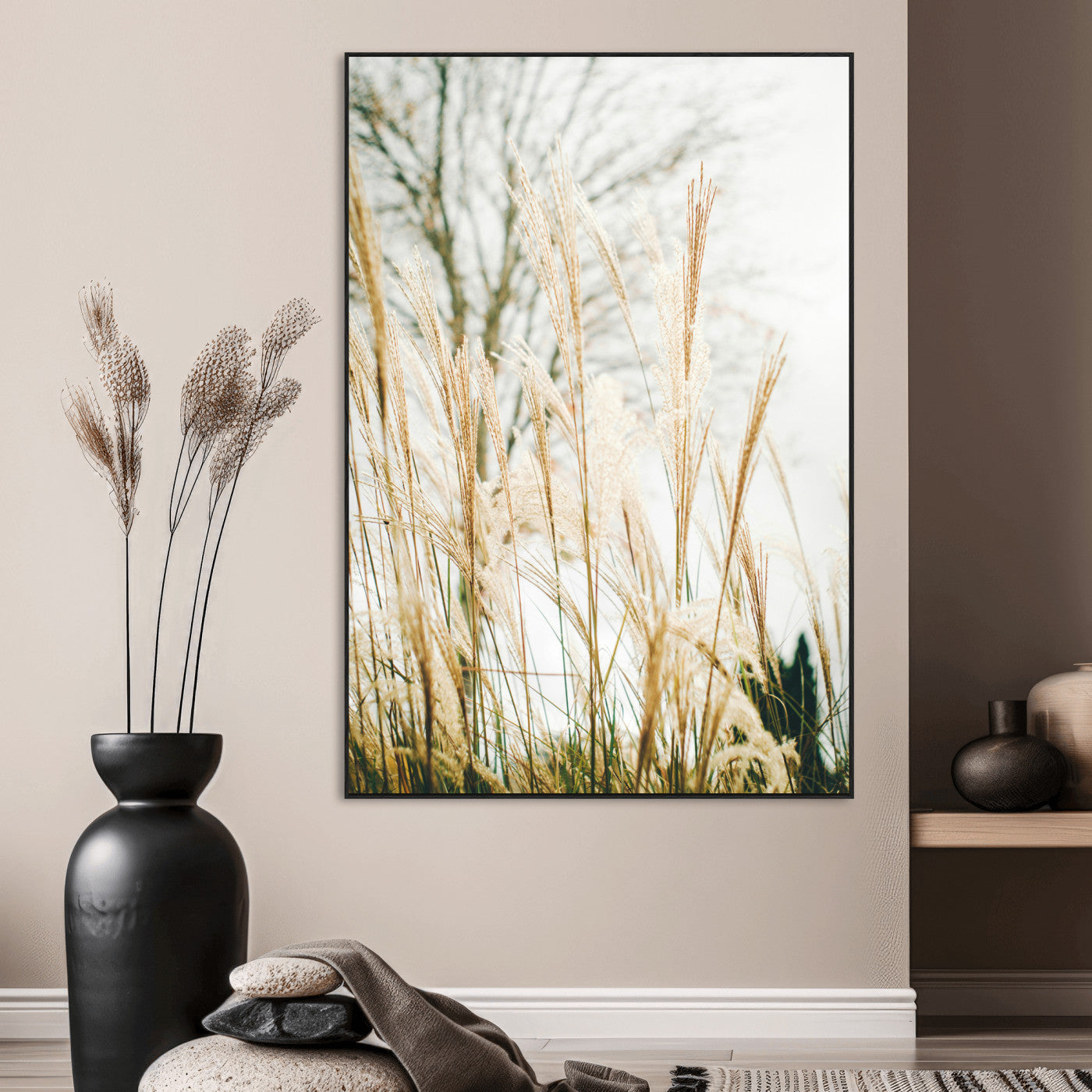 Soft beige pampas grass swaying in the breeze against a muted sky, creating a tranquil and minimalist botanical aesthetic.
