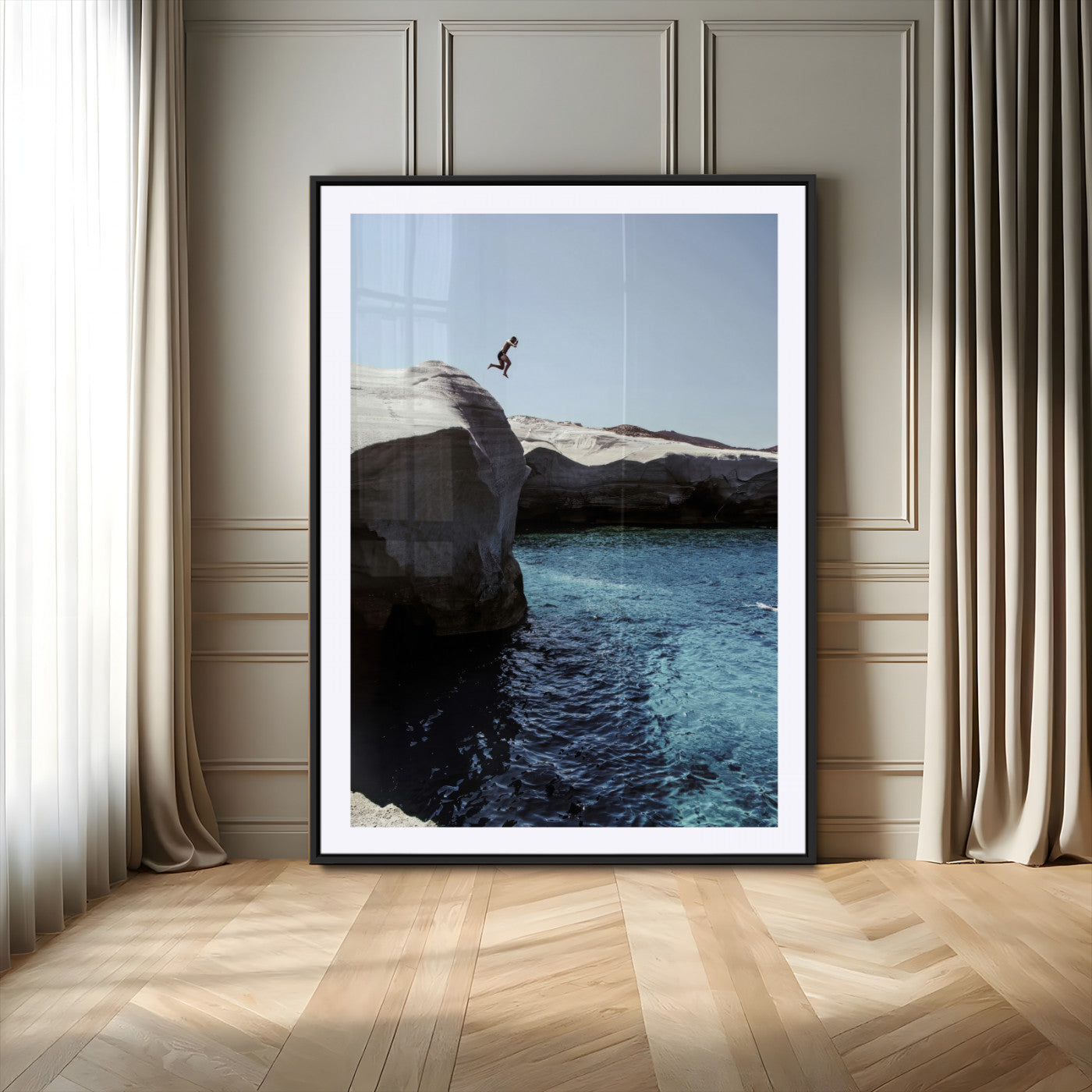 Canvas of a cliff diver above turquoise waters and rocky coastline under clear sky, ideal for adventurous minimalist or coastal home decor.