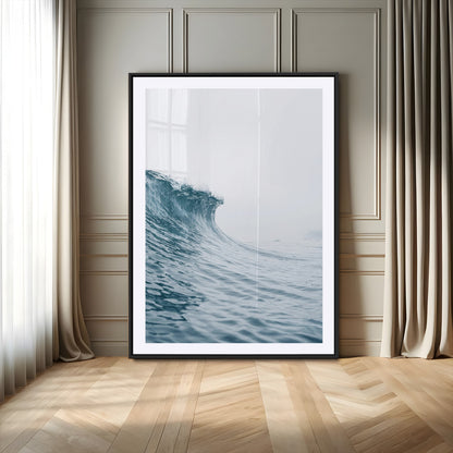 A single ocean wave curling in soft blue tones under a misty sky, ideal for coastal or minimalist home wall decor.