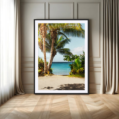Tropical beach with palm trees, blue ocean, and clear sky, perfect for coastal or beach-themed wall decor in sunny living spaces.
