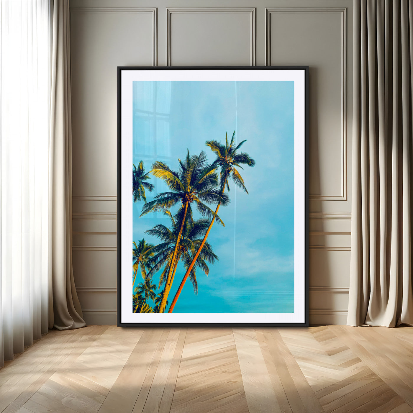 "Tall palm trees with golden sunlight against a vibrant blue sky, creating a tropical, relaxing atmosphere for coastal and beach-themed decor.