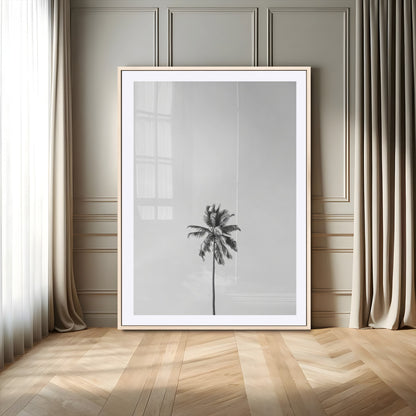 Canvas of a single palm tree in black and white with minimalist sky, ideal for modern coastal minimalist or tropical-inspired home decor.