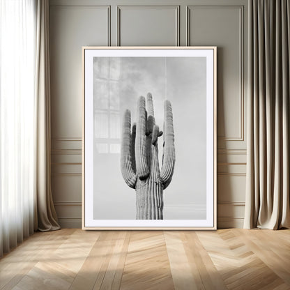Canvas of a tall saguaro cactus in black and white with moody tones, perfect for southwestern minimalist or modern desert-themed home decor.