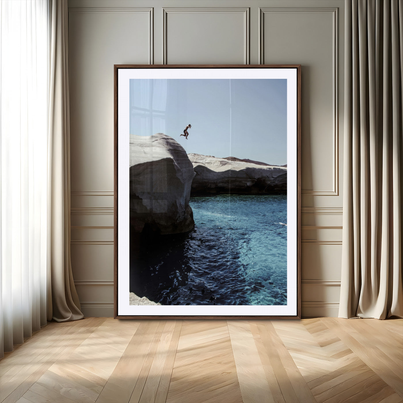 Canvas of a cliff diver above turquoise waters and rocky coastline under clear sky, ideal for adventurous minimalist or coastal home decor.