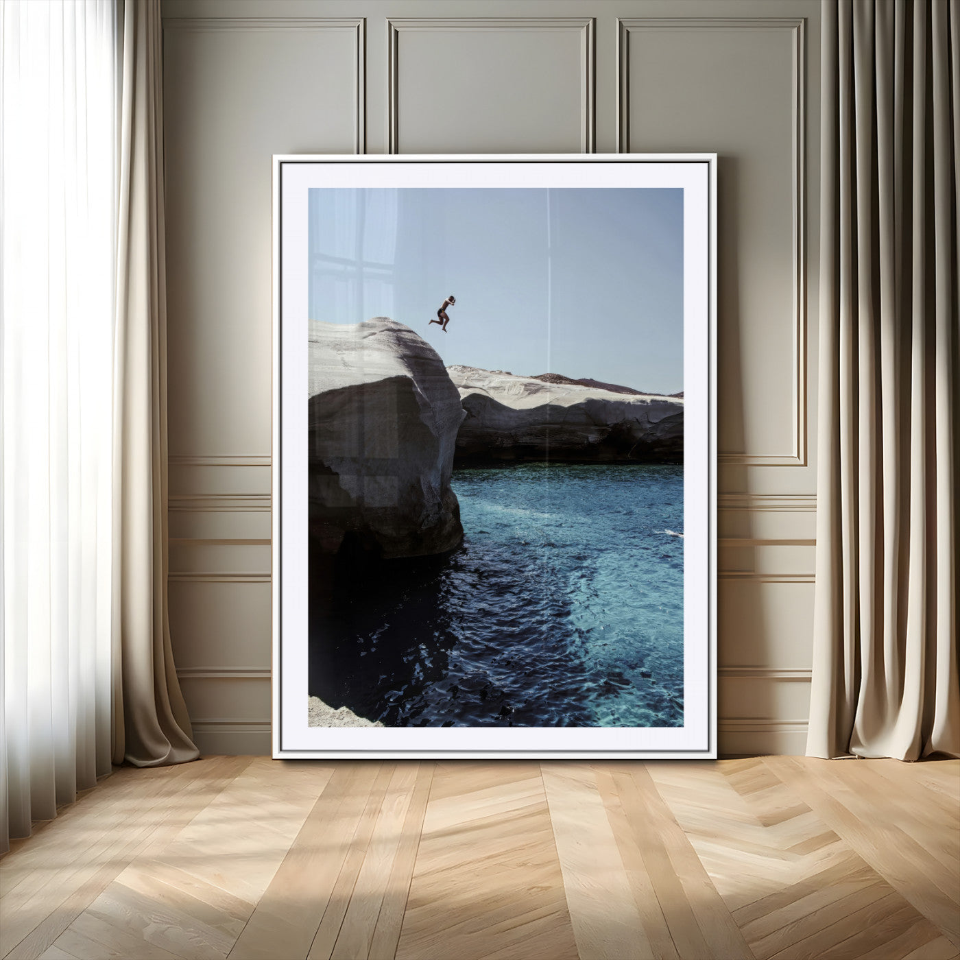Canvas of a cliff diver above turquoise waters and rocky coastline under clear sky, ideal for adventurous minimalist or coastal home decor.