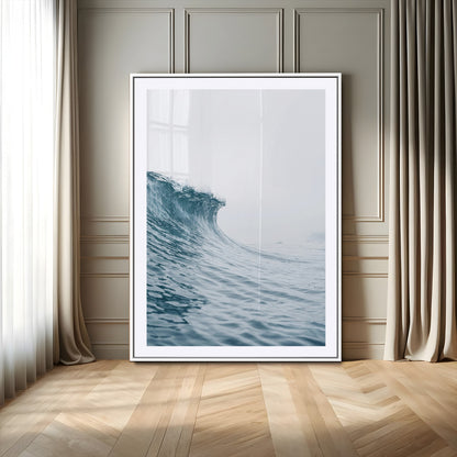 A single ocean wave curling in soft blue tones under a misty sky, ideal for coastal or minimalist home wall decor.