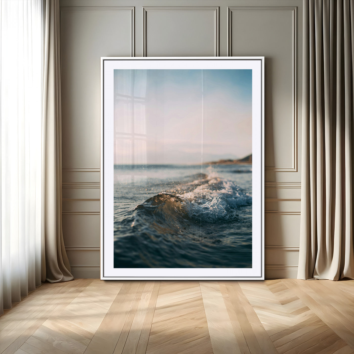 Close-up of ocean waves rolling gently toward the shore at sunset, creating a peaceful and minimalist coastal scene.