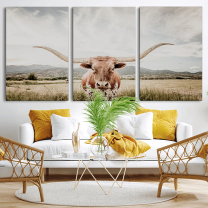 Longhorn Wall Art Print - Western Cow Canvas Print, featuring a majestic Texas longhorn in a rustic prairie setting, perfect for farmhouse and western decor.