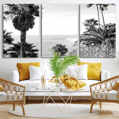Monochrome canvas of palm trees framing a coastal surf scene, perfect for California-inspired or retro black-and-white beach decor.