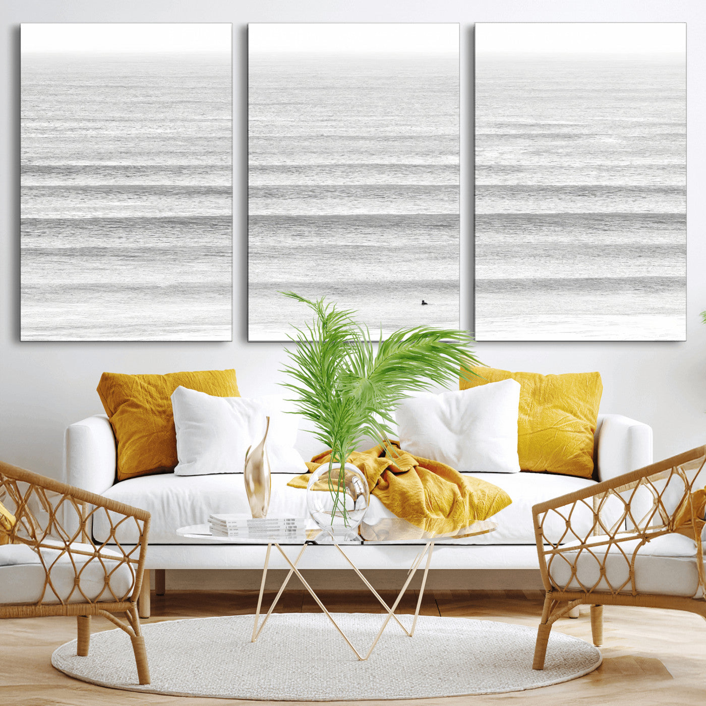 Monochrome photo of a lone surfer in calm layered waves, perfect for minimalist coastal or moody ocean-inspired wall decoration.