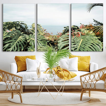 Monstera leaves and tropical flowers framing a calm ocean view, ideal for tropical coastal or exotic jungle-style interior wall decor.