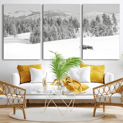 Snowy bison walking through white forest landscape, ideal for monochrome winter or wilderness-style interior wall decoration.