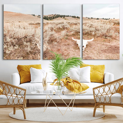 Rustic bull skull on dry sagebrush field under soft light, ideal for western minimal or desert prairie-style wall decoration.