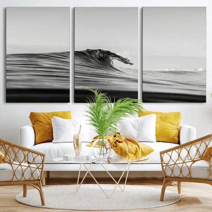 Striking black and white photo of a curling wave, ideal for modern coastal or minimalist wall decor settings.