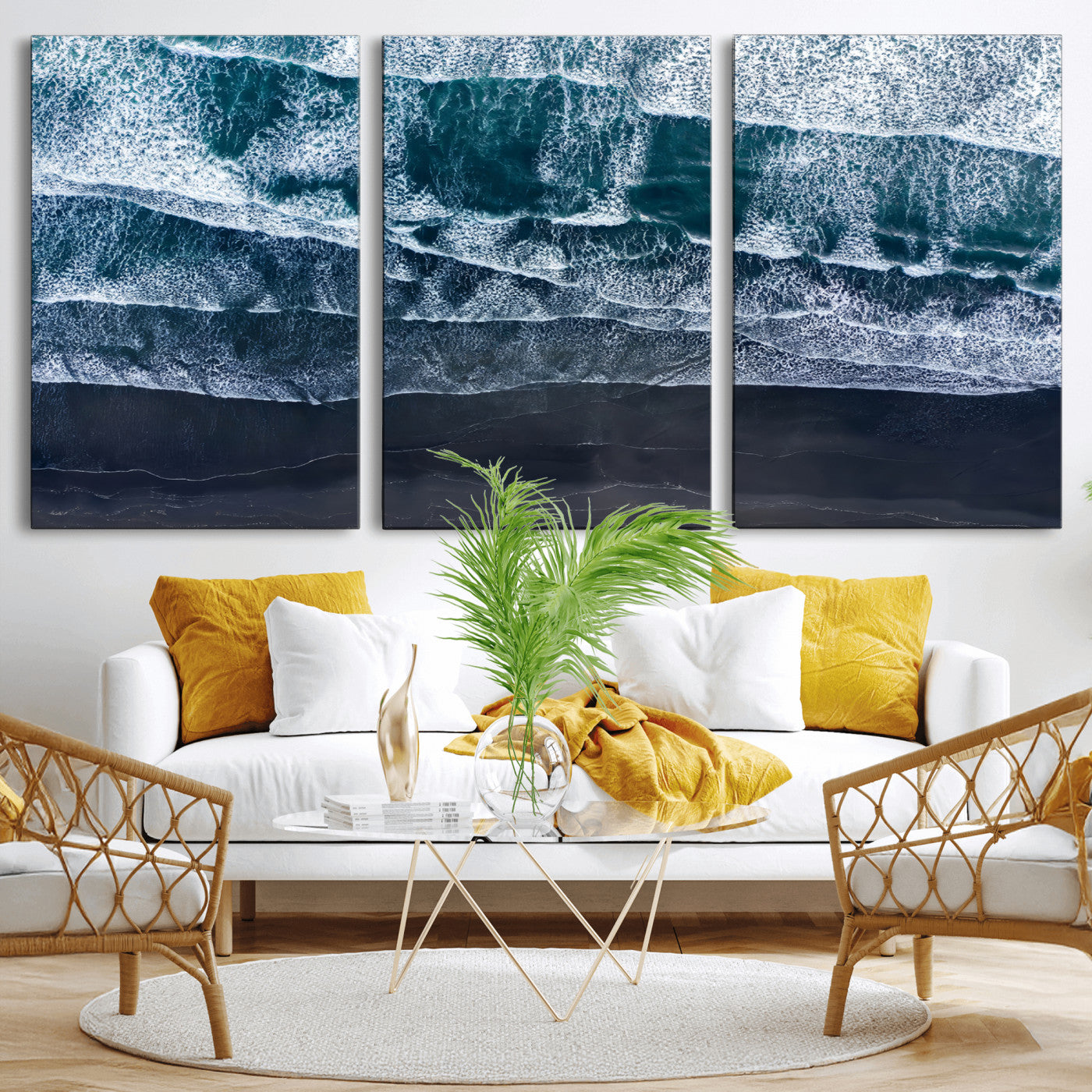 Canvas of aerial ocean waves crashing onto a black sand beach in moody tones, ideal for modern coastal or minimalist home decor.