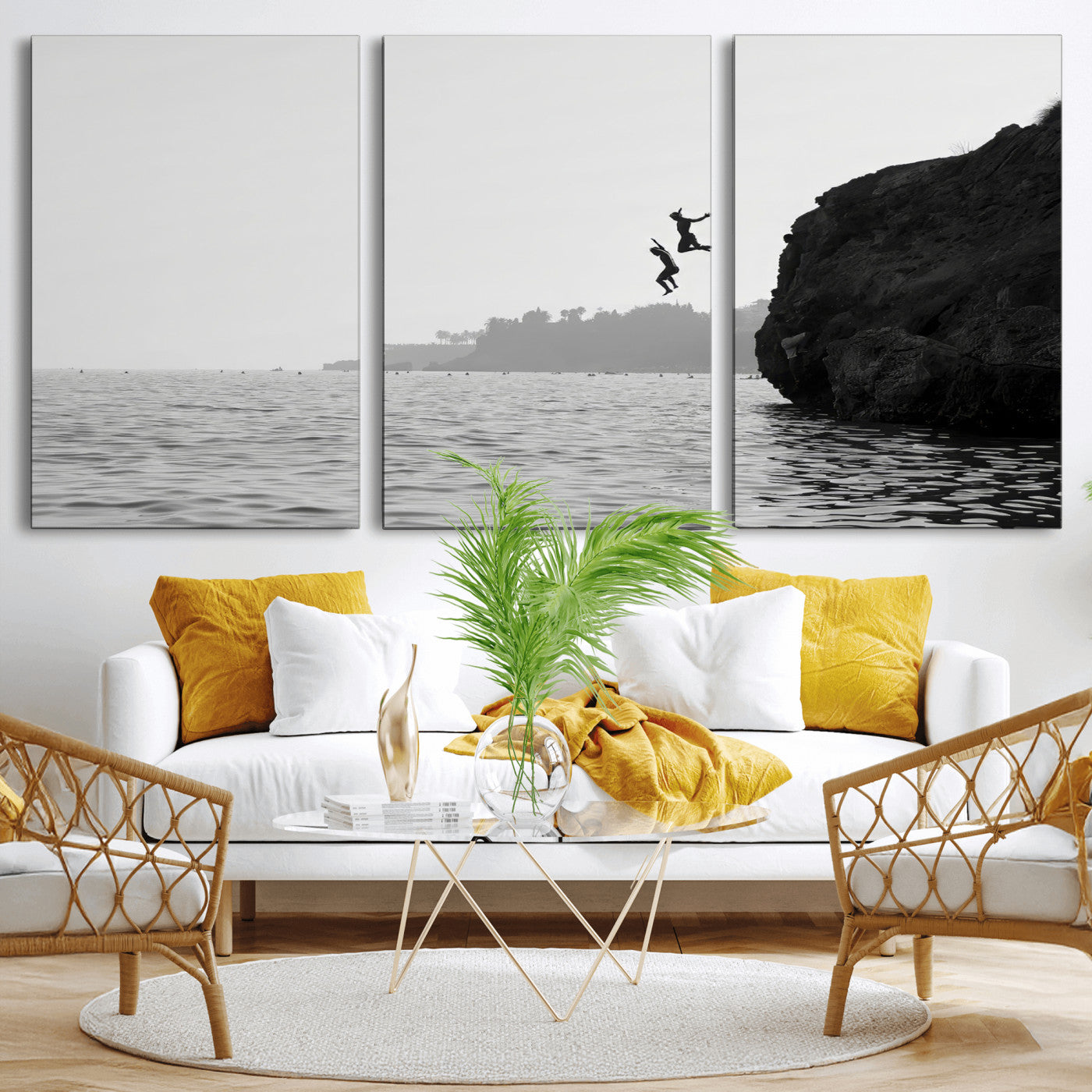 Black and white canvas of two figures cliff jumping into the sea, captured with moody tones, ideal for modern coastal or adventure-themed home decor.   2/2