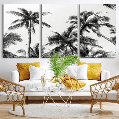 Black and white canvas of tall palm trees in moody tones, perfect for modern tropical minimalist or coastal-style home decor.