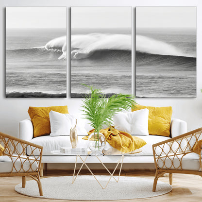 A dramatic black and white ocean wave crashing with immense force, capturing the raw power and movement of the sea in a bold seascape.