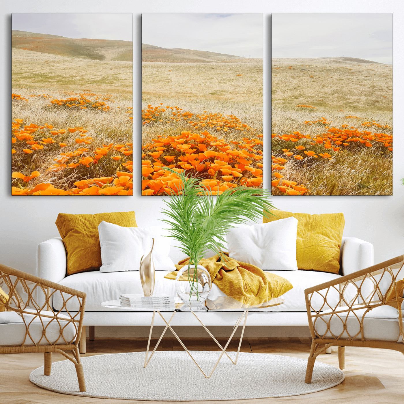 A golden field with vibrant orange poppies blooming across rolling hills under a soft, sunlit sky, creating a warm and rustic landscape.