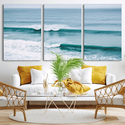 Powerful ocean waves rolling towards the shore, their turquoise hues blending with white sea foam under an open horizon, capturing the essence of the ocean's movement.