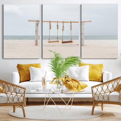 A rustic wooden beach swing stands on a serene sandy shore with an ocean horizon in the background, creating a tranquil and dreamy coastal escape.