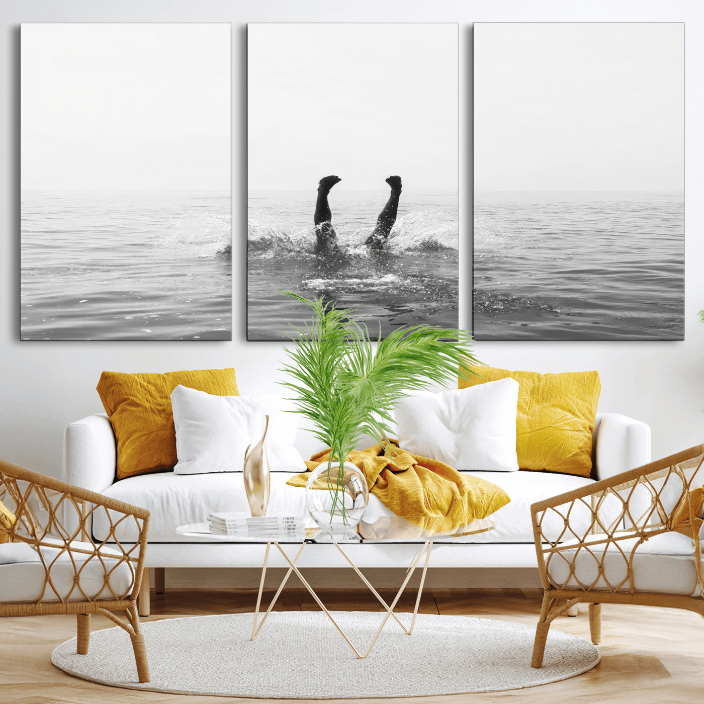 A black and white minimalist water scene capturing a playful splash as a swimmer dives upside down, creating a carefree and artistic aquatic aesthetic.