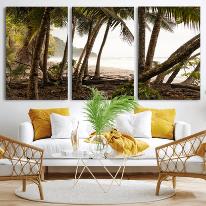 Dense tropical palm trees framing a sandy beach and ocean shore, ideal for jungle or coastal themed interior wall decor.