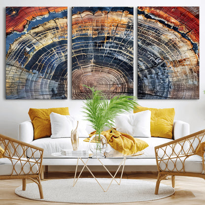 Vibrant tree ring with orange, brown, and blue tones in abstract detail, perfect for rustic or boho-inspired wall decor.