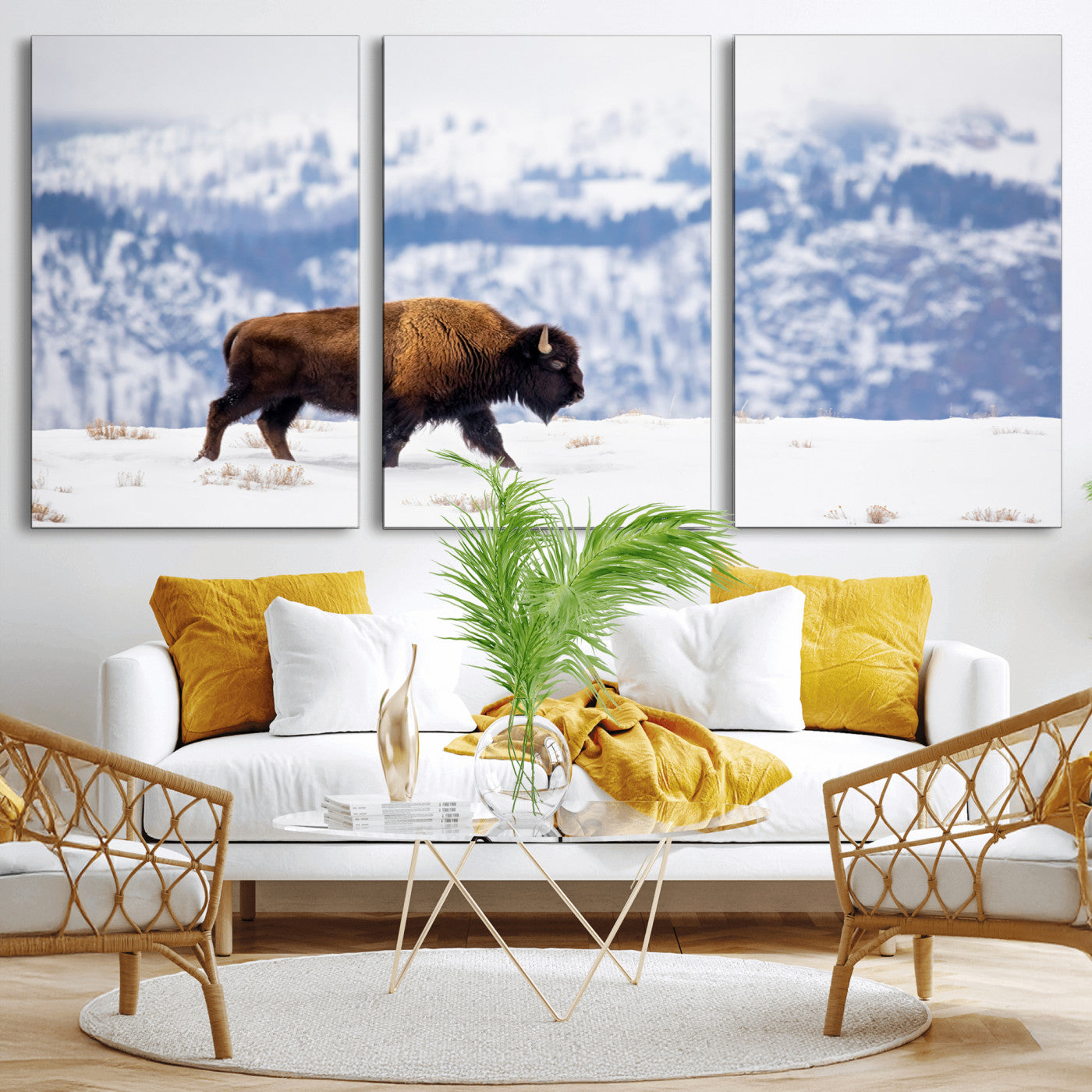 A lone bison walks across snowy ground with blue-toned mountain range behind, ideal for rustic or western farmhouse interiors.