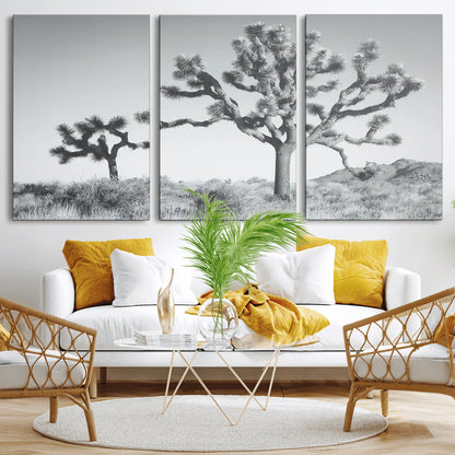 Black and white Joshua tree in a desert landscape with soft light and dry brush, perfect for rustic or minimalist home decor.