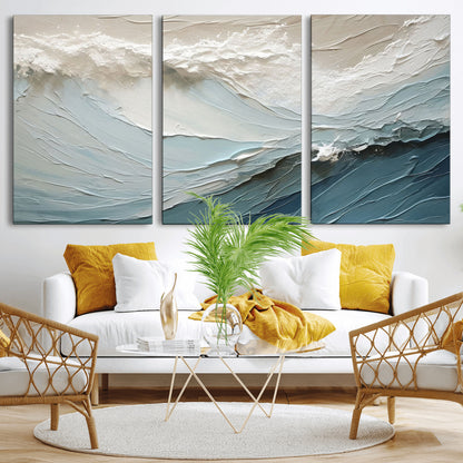 Textured canvas of ocean waves in soft coastal blues and creamy whites, ideal for modern or minimalist coastal-style interiors.