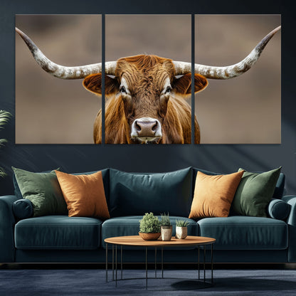 Close-up of a Texas Longhorn with strong curved horns and warm brown tones, perfect for rustic or western-style wall decor.