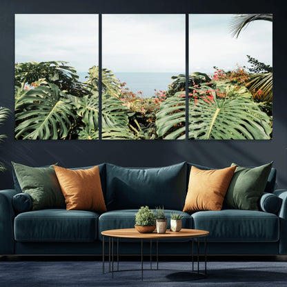Monstera leaves and tropical flowers framing a calm ocean view, ideal for tropical coastal or exotic jungle-style interior wall decor.