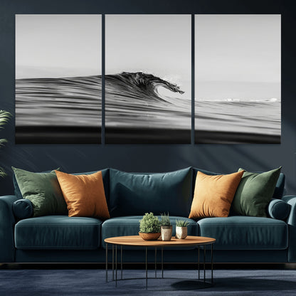 Striking black and white photo of a curling wave, ideal for modern coastal or minimalist wall decor settings.