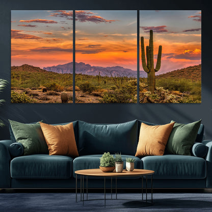 Vibrant desert sunset with saguaro cacti and distant mountains, perfect for Southwestern or warm-toned home decor.