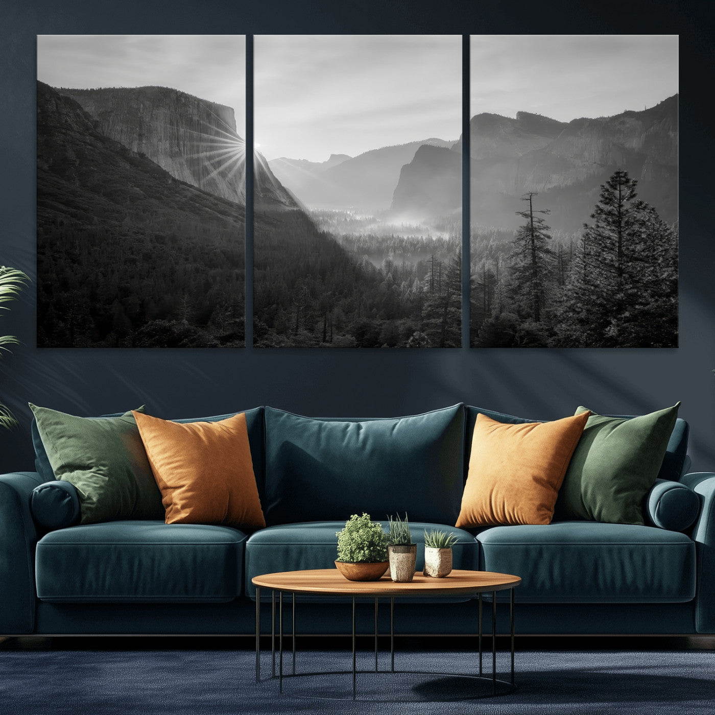 Black and white landscape of Yosemite with sun rays peeking over El Capitan, ideal for moody nature or modern rustic decor.
