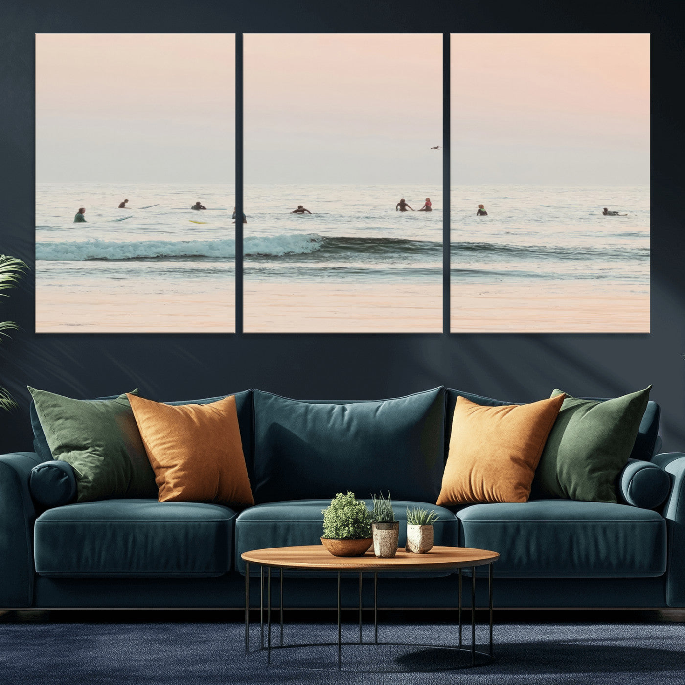 Dreamy photo of surfers waiting on soft pastel waves under a pink sunset sky, ideal for soft coastal minimalist or serene ocean-themed home decor.