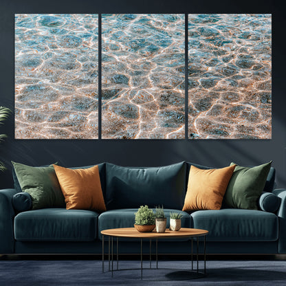 Close-up of sunlit ocean ripples with aqua blue and golden tones, ideal for modern coastal or minimalist home decor.