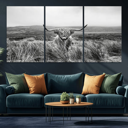 A black and white portrait of a Highland cow in a foggy Scottish countryside, capturing a rustic aesthetic and tranquil farm escape.