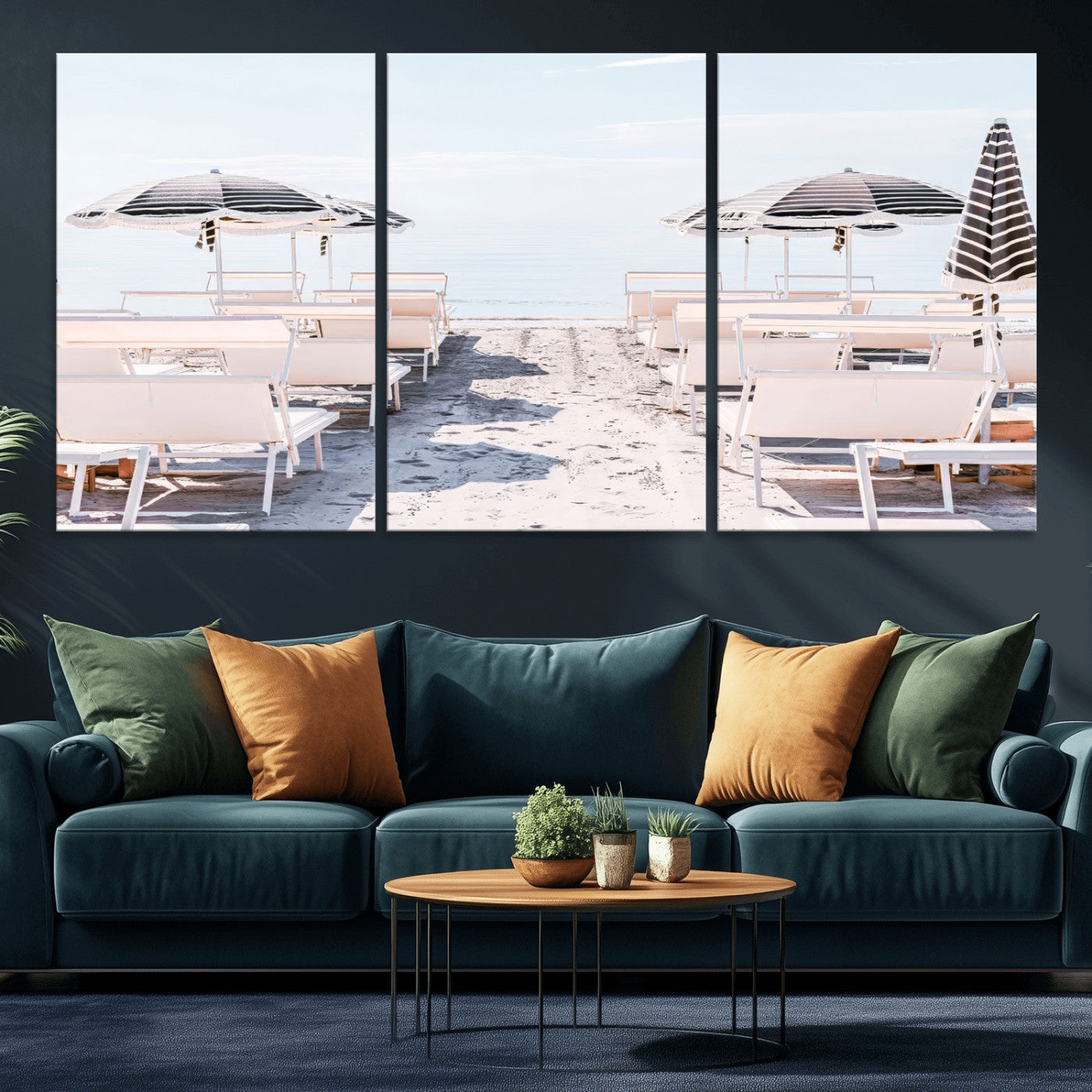 A serene minimalist beach scene featuring striped umbrellas, soft pastel sand, and an elegant lounge setup, creating a tranquil and stylish coastal retreat.