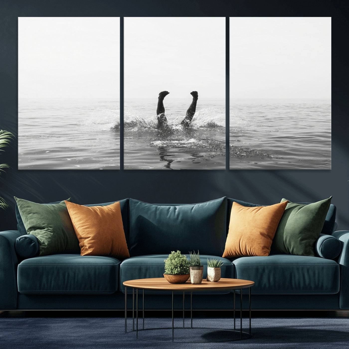 A black and white minimalist water scene capturing a playful splash as a swimmer dives upside down, creating a carefree and artistic aquatic aesthetic.