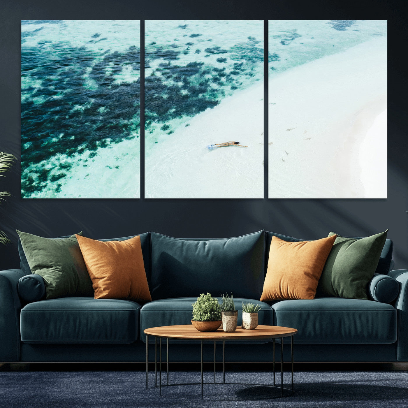 Canvas featuring an aerial view of a swimmer in shallow turquoise waters with coral patterns, ideal for tropical coastal home decor.