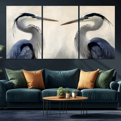 Two blue herons facing each other on a soft neutral background, ideal for coastal, tranquil, or nature-inspired minimalist interiors.